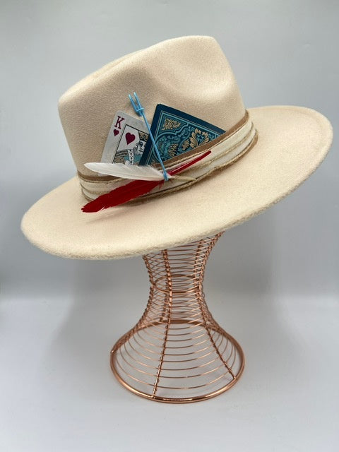 Beige fedora with blue card