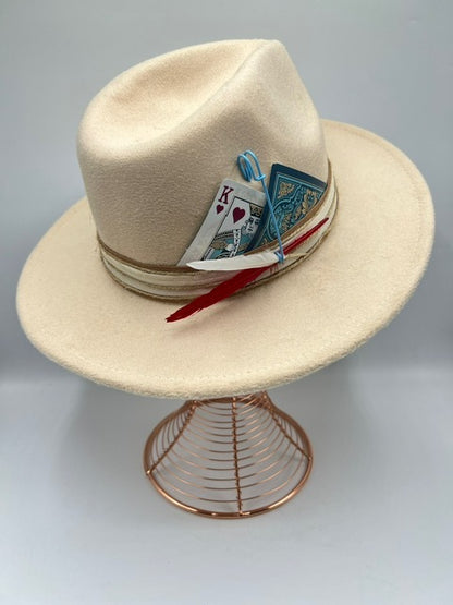 Beige fedora with blue card