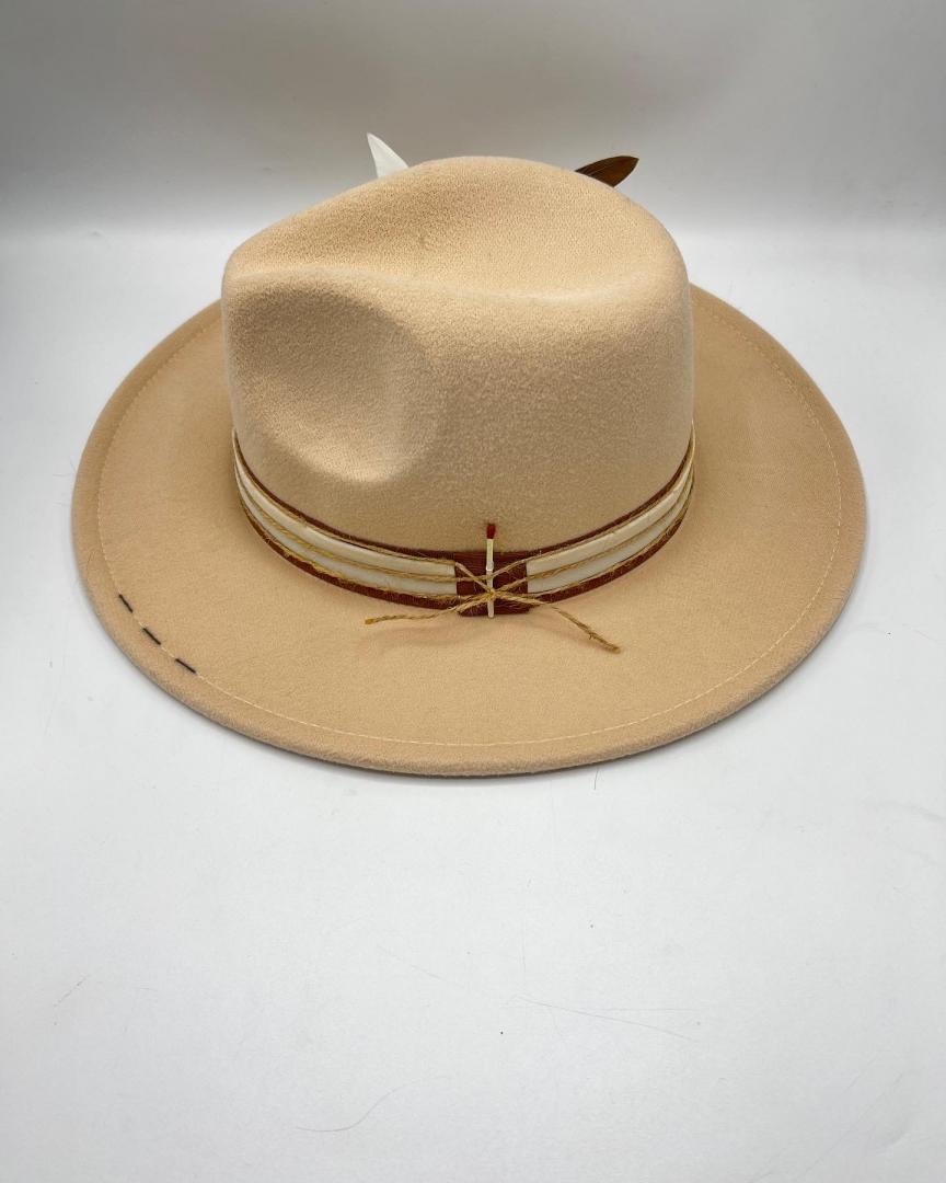 Beige fedora with golden feather