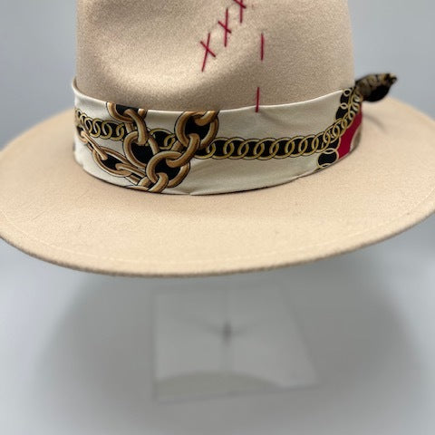 Beige fedora with red details