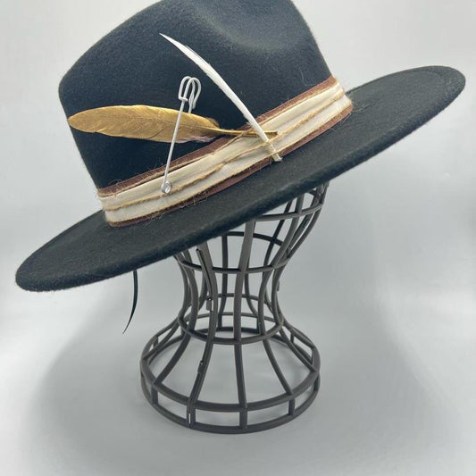 Black fedora with gold feather