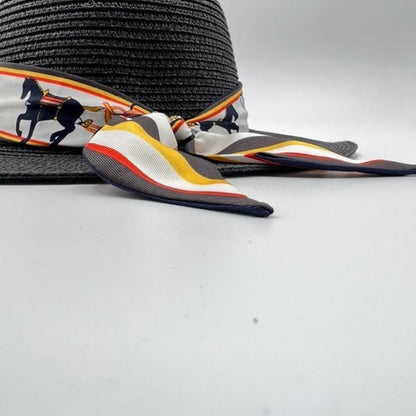 Black straw fedora with pearl pin