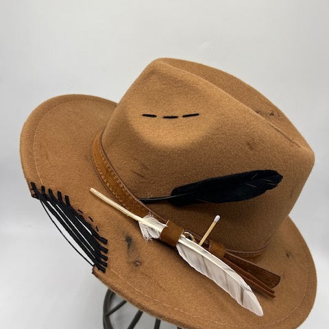 Brown fedora with burns and cut