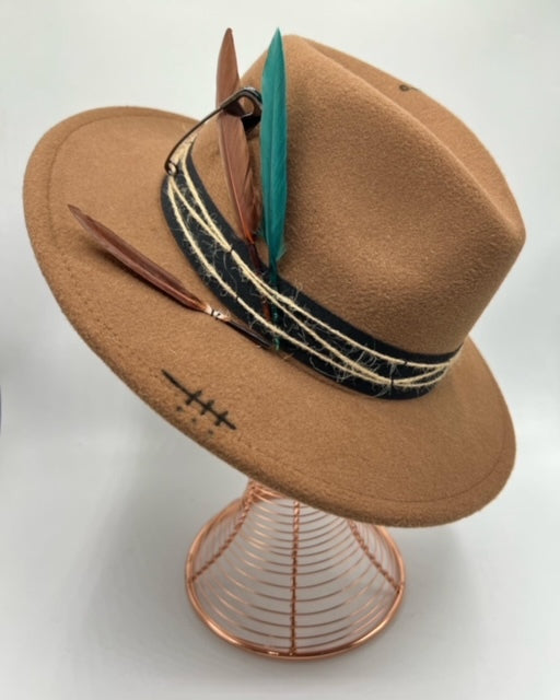 Brown fedora with green touch