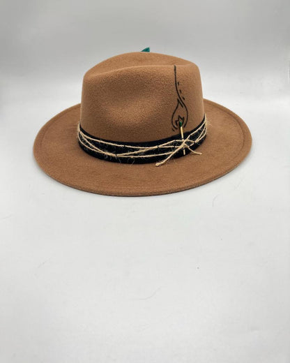 Brown fedora with green touch