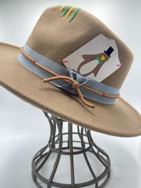 Brown trilby with unique accessories