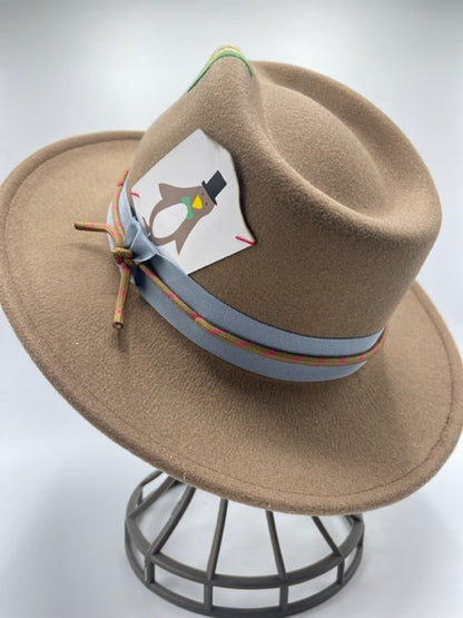 Brown trilby with unique accessories