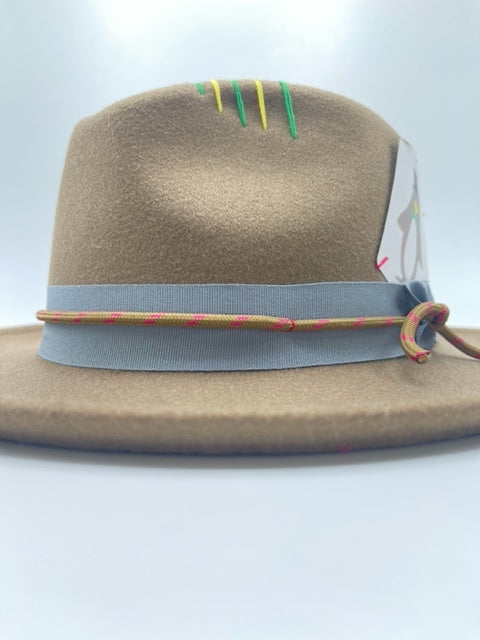 Brown trilby with unique accessories