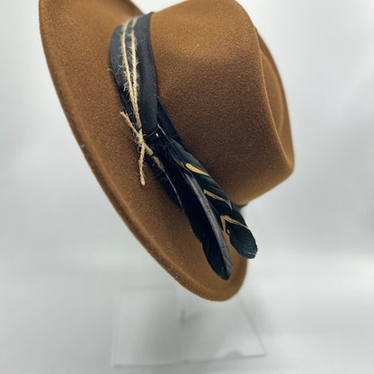 Brown unique fedora with black strap and feather