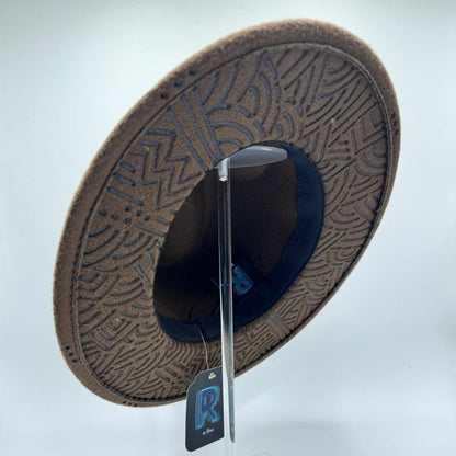 Brown fedora with carving from inside