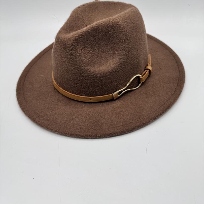 Brown fedora with carving from inside