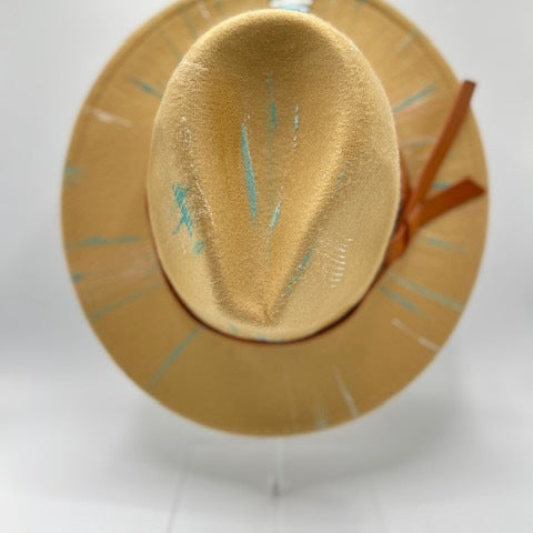 Cappuccino color fedora with a cut