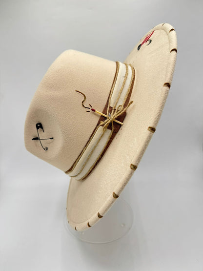 Beige fedora with cards and feathers