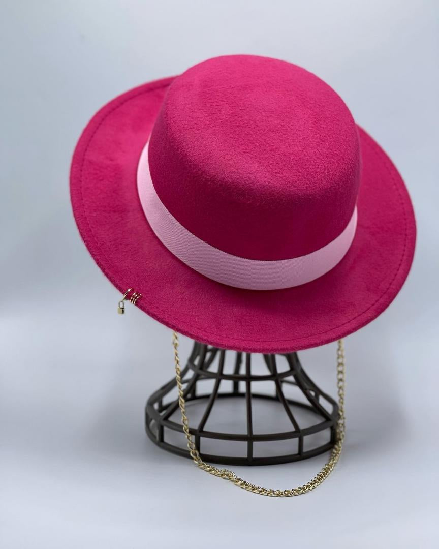 Elegant and unique fuchsia boater hat