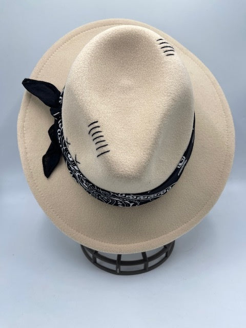 Fedora hat accessorized with classic scarf and a chic twist - beige