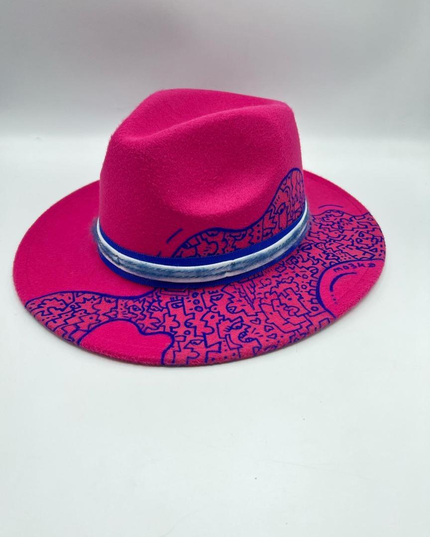 Fuchsia fedora with blue hand drawing