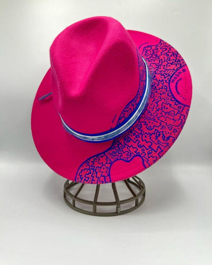 Fuchsia fedora with blue hand drawing