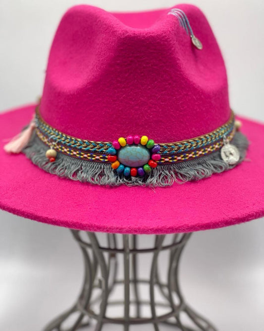 Fuchsia fedora with plane accessory