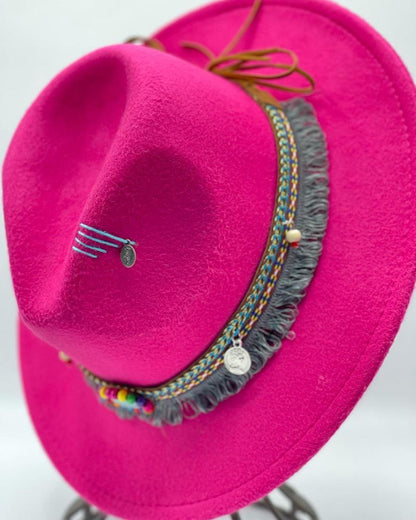 Fuchsia fedora with plane accessory