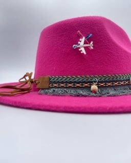 Fuchsia fedora with plane accessory