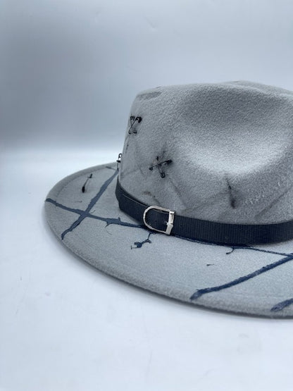 Grey fedora with safety pins