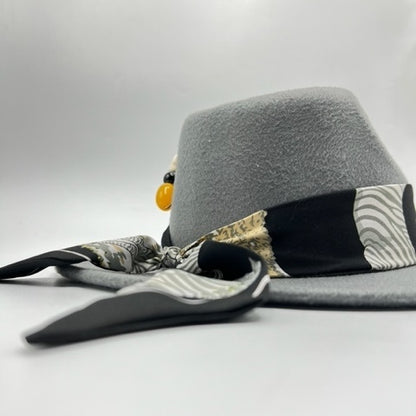 Grey fedora with yellow accessories