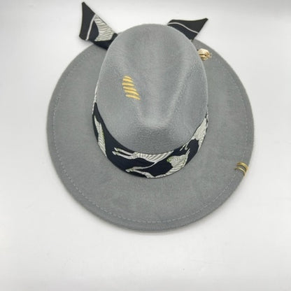 Grey fedora with yellow accessories