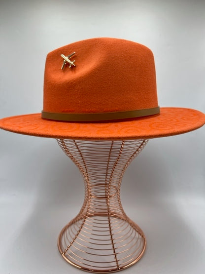 Hand drawn orange fedora with airplane