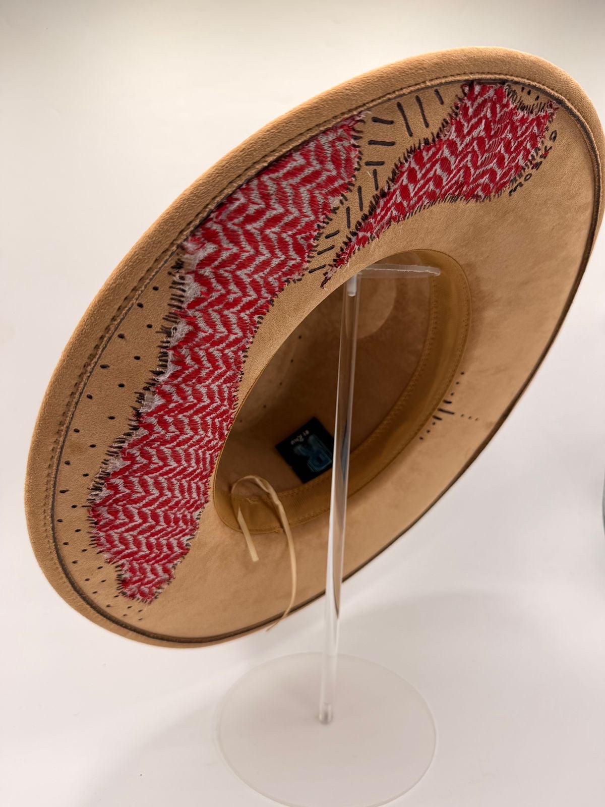 Wide brim light brown fedora with red shemagh fabric