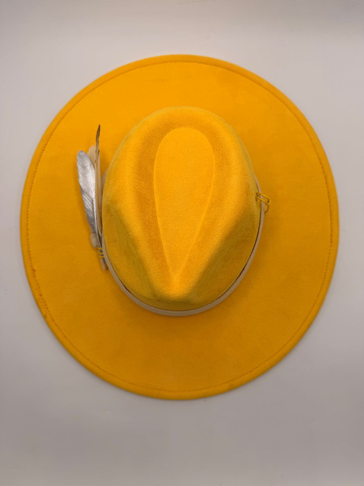 Yellow wide brim fedora with feathers