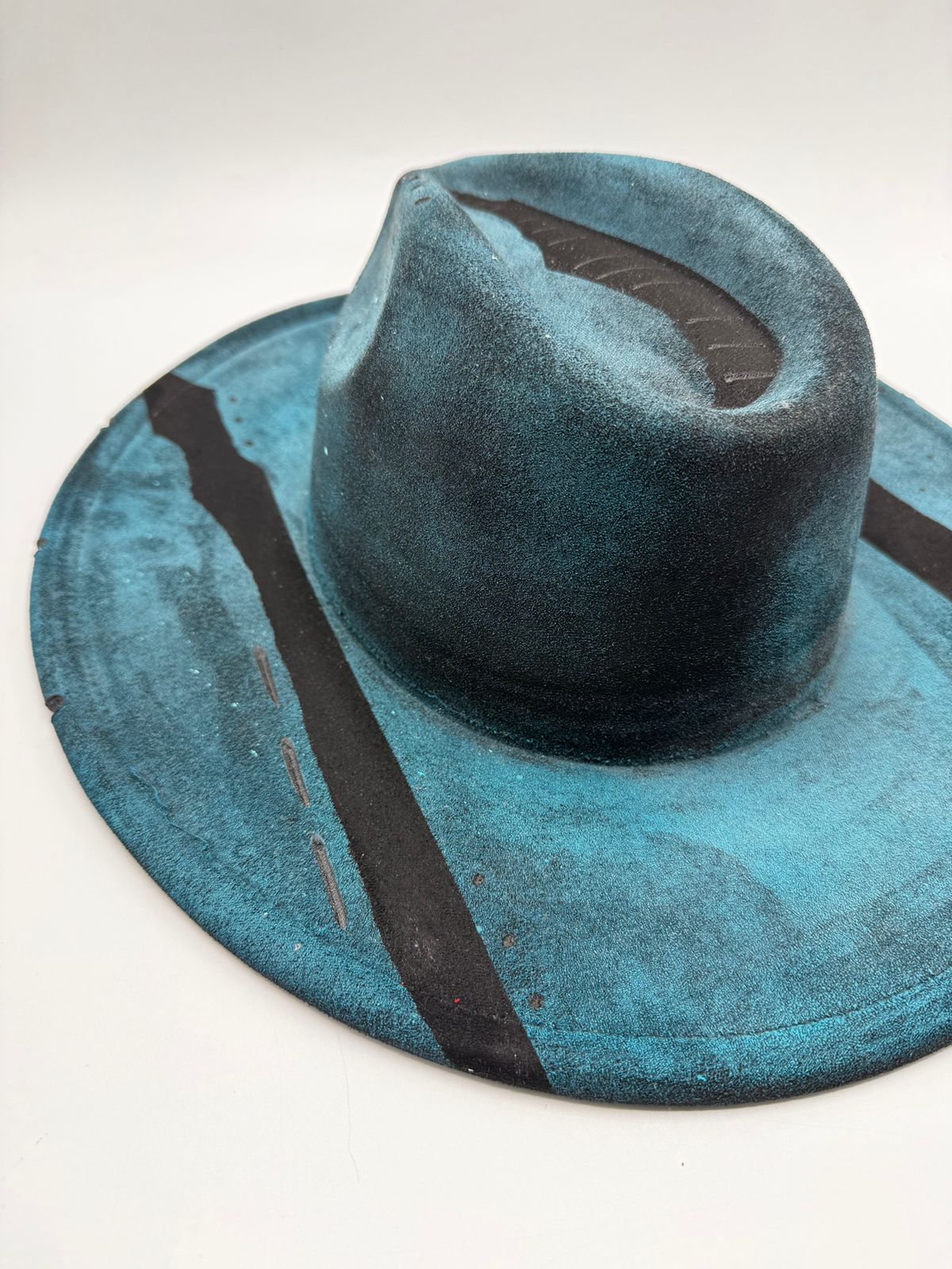 Wide brim black and blue painted fedora