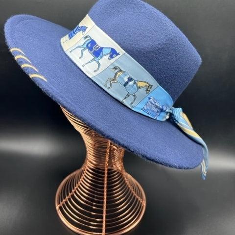 Navy blue fedora with angel accessory