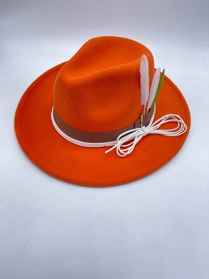 Orange fedora with feathers