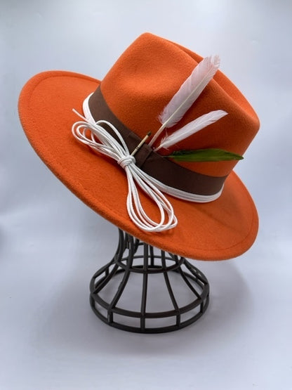 Orange fedora with feathers