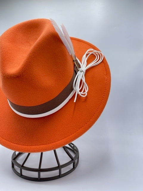 Orange fedora with feathers