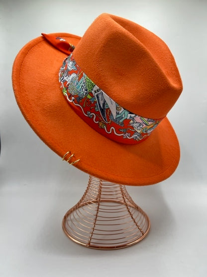 Orange fedora with golden rings