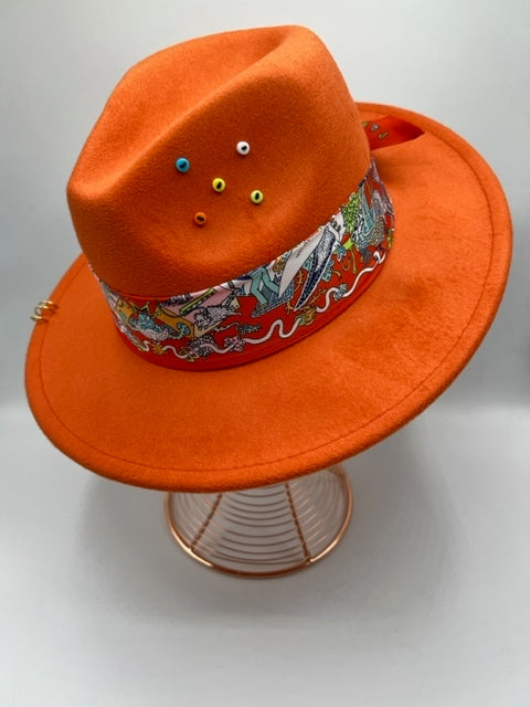 Orange fedora with golden rings