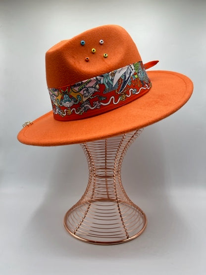 Orange fedora with golden rings