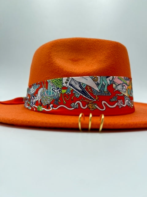 Orange fedora with golden rings