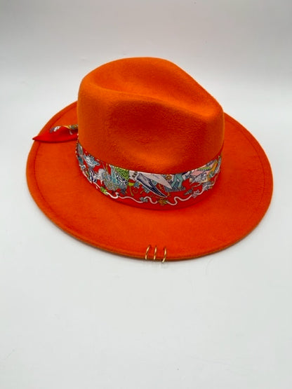 Orange fedora with golden rings