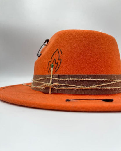 Orange fedora with playing card and flame