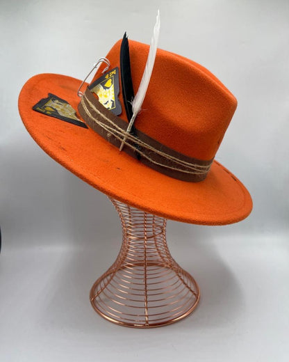 Orange fedora with playing card and flame