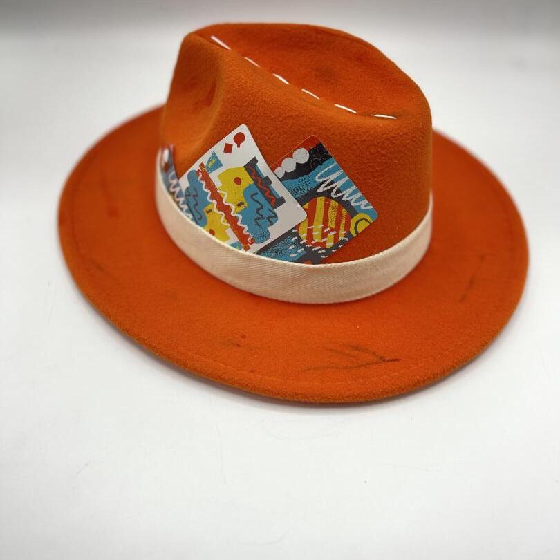 Orange fedora with white and blue details