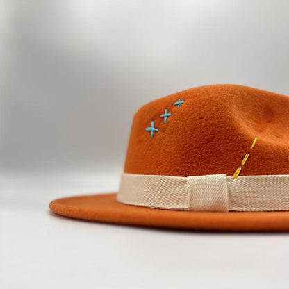 Orange fedora with white and blue details