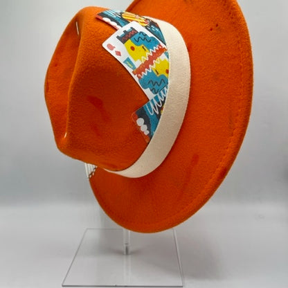 Orange fedora with white and blue details