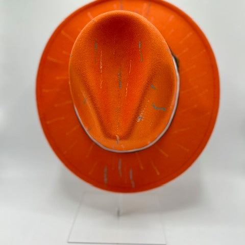 Orange fedora with white and brown band