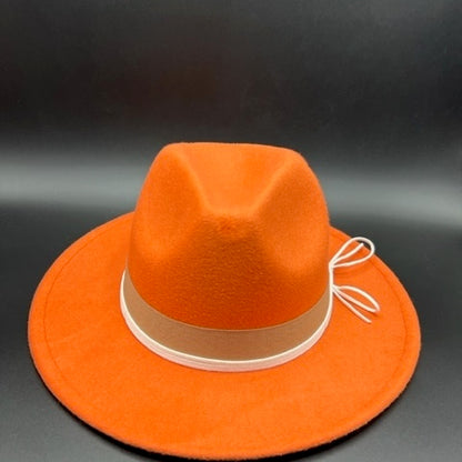 Orange fedora with white leather straps