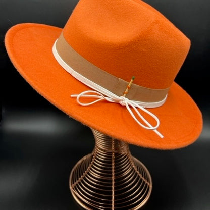 Orange fedora with white leather straps