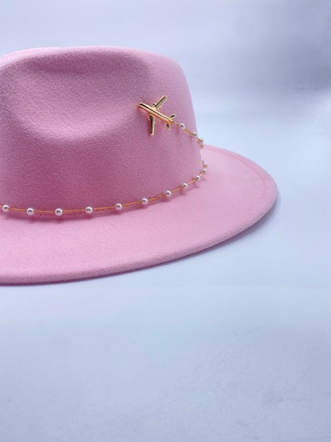 Pink wool fedora hat with airplane accessory