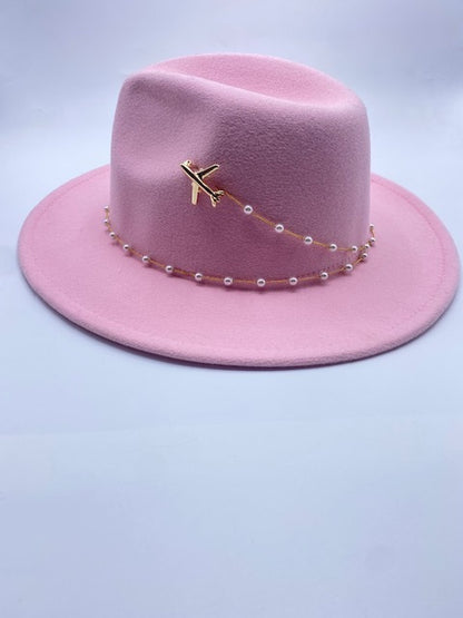 Pink wool fedora hat with airplane accessory